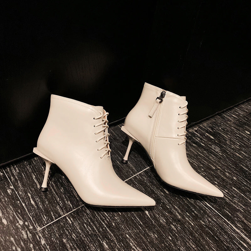 Pointed lace up booties