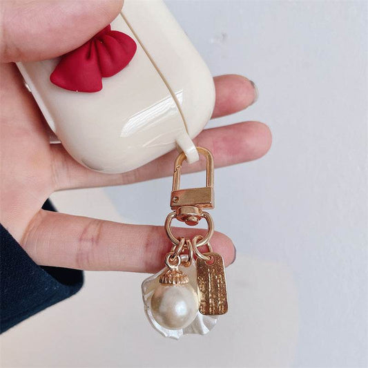 Beige Red Bow Shell Pendant Wireless Earphone Case - Mubimart