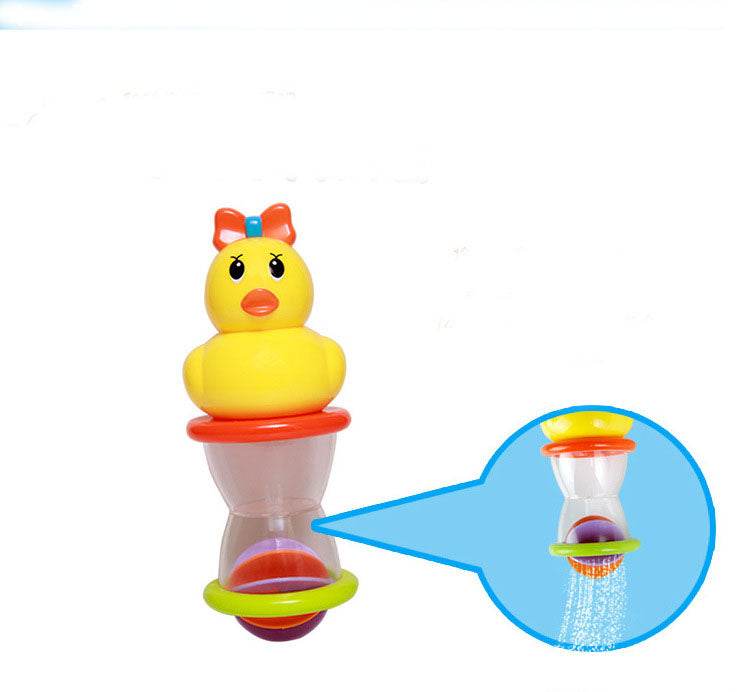 Baby Playing In The Water With A Duck Toy - Mubimart