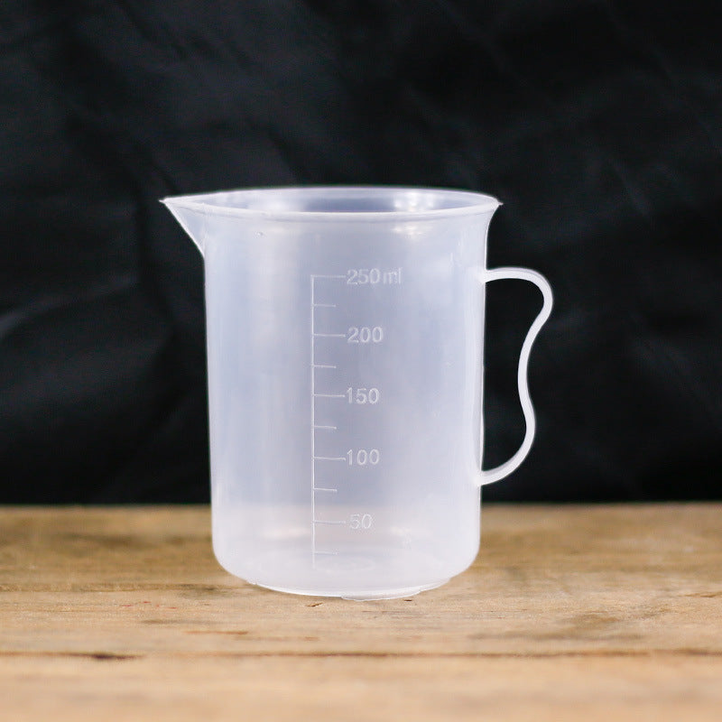 Plastic measuring cup with scale - Mubimart -  