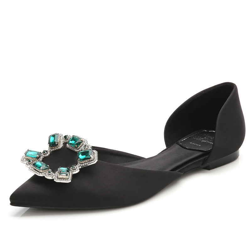 Platte, lage sandalen met puntige neus en diamantmotief